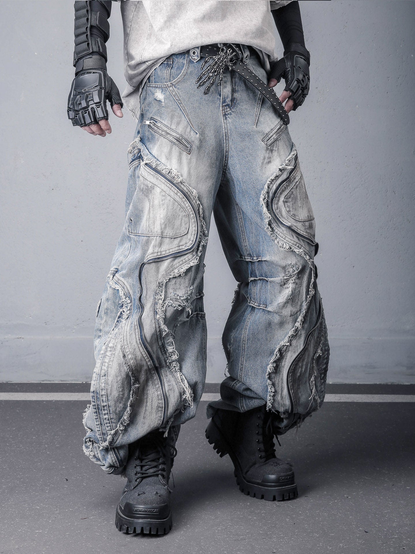 Sanhoostudio denim pants featuring fringe details, deconstructed design, and wide leg silhouette for standout streetwear outfits.
