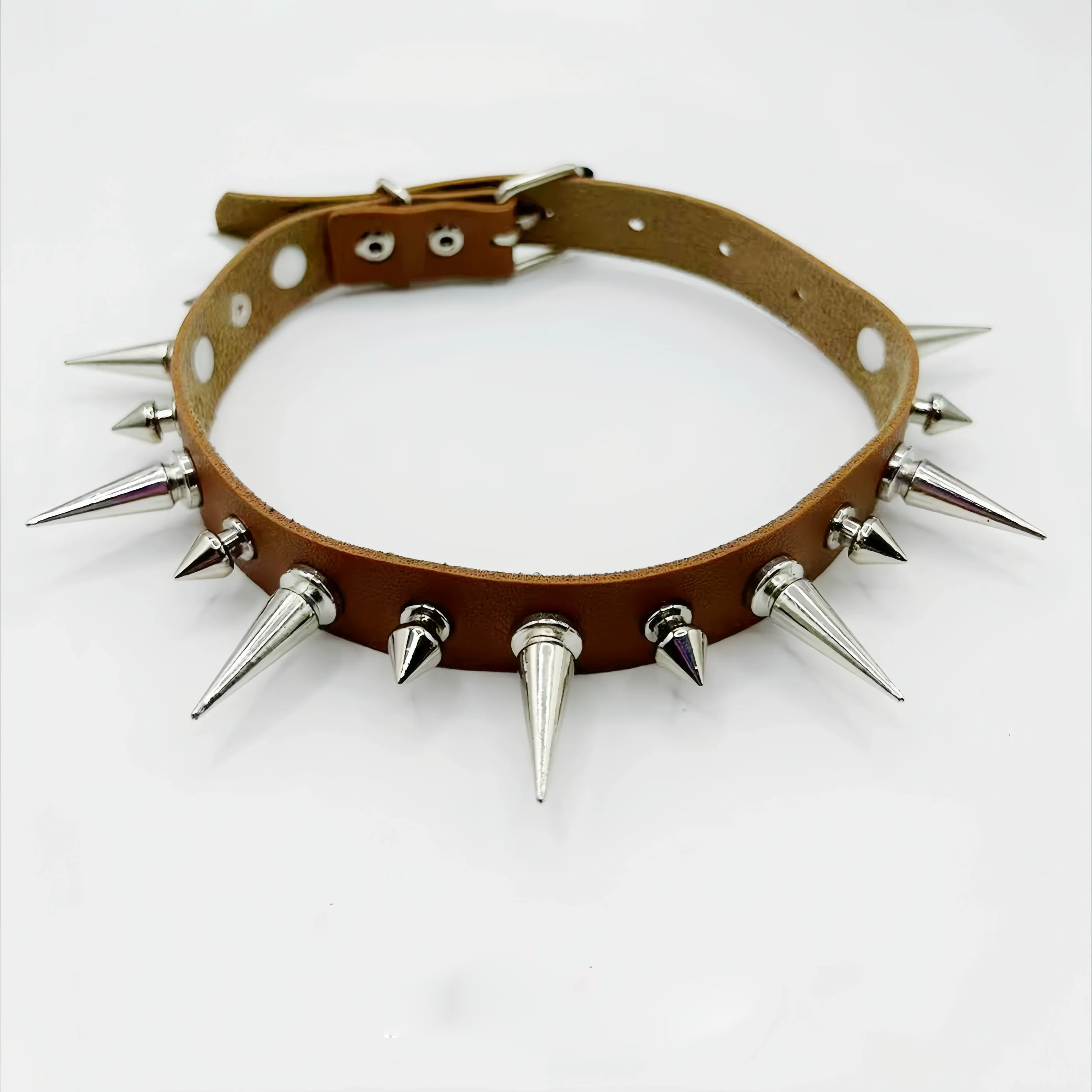 Discover Sanhoostudio’s rock studded punk leather choker, blending Y2K subculture aesthetics with bold metal detailing for a rebellious, fashion-forward accessory that elevates streetwear outfits.