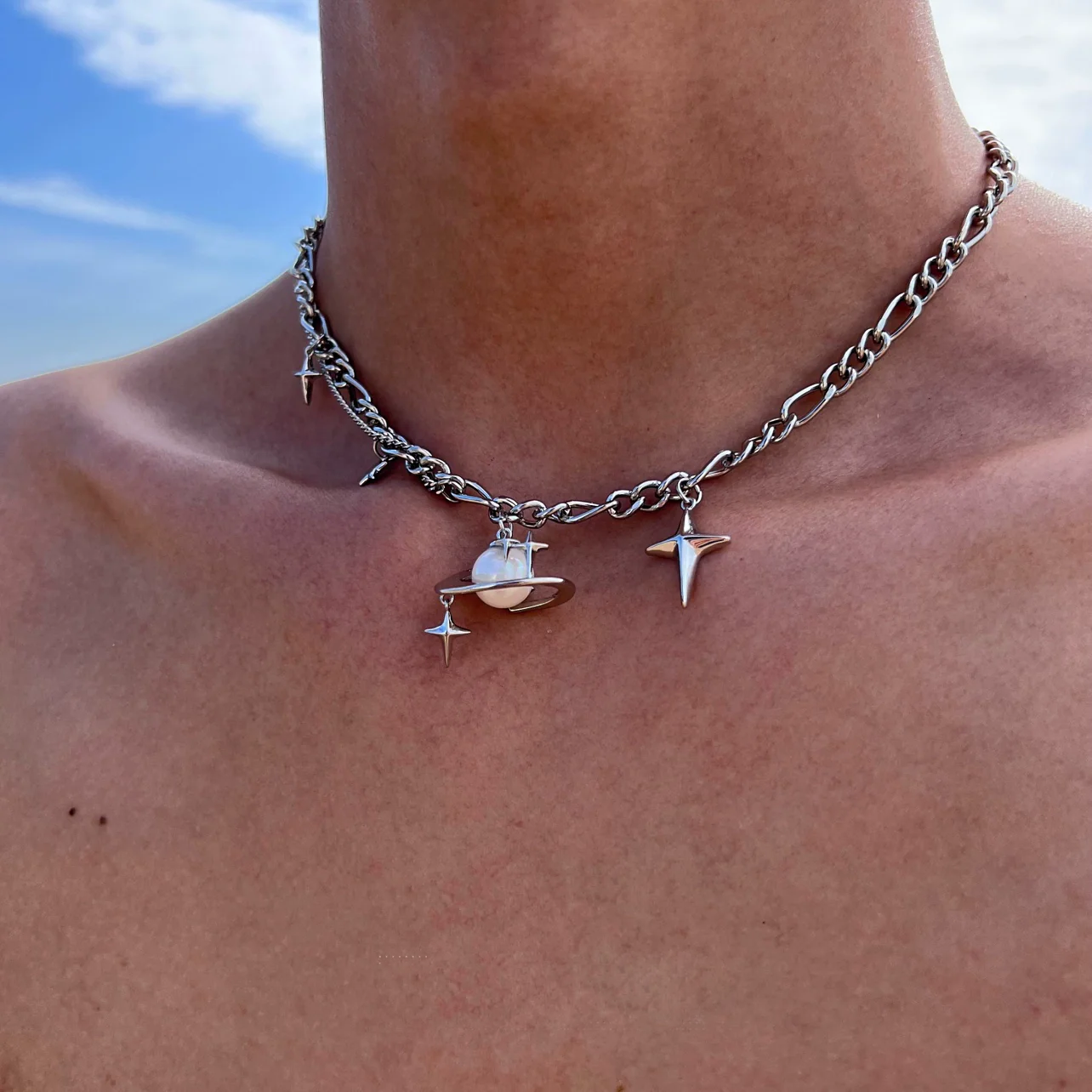 Discover the star geometric pearl layered necklace from Sanhoostudio, designed with chic pearl details and modern double chain style. Perfect for layering with streetwear or luxury outfits. Shop necklaces now at Sanhoostudio.