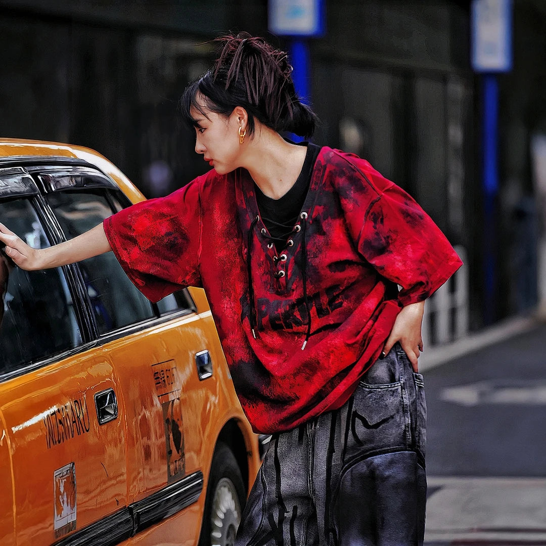 Sanhoostudio short sleeve T-shirt featuring hand painted artwork, patchwork detailing, and oversized fit silhouette. Designed for standout streetwear styling with breathable comfort and relaxed everyday wear.