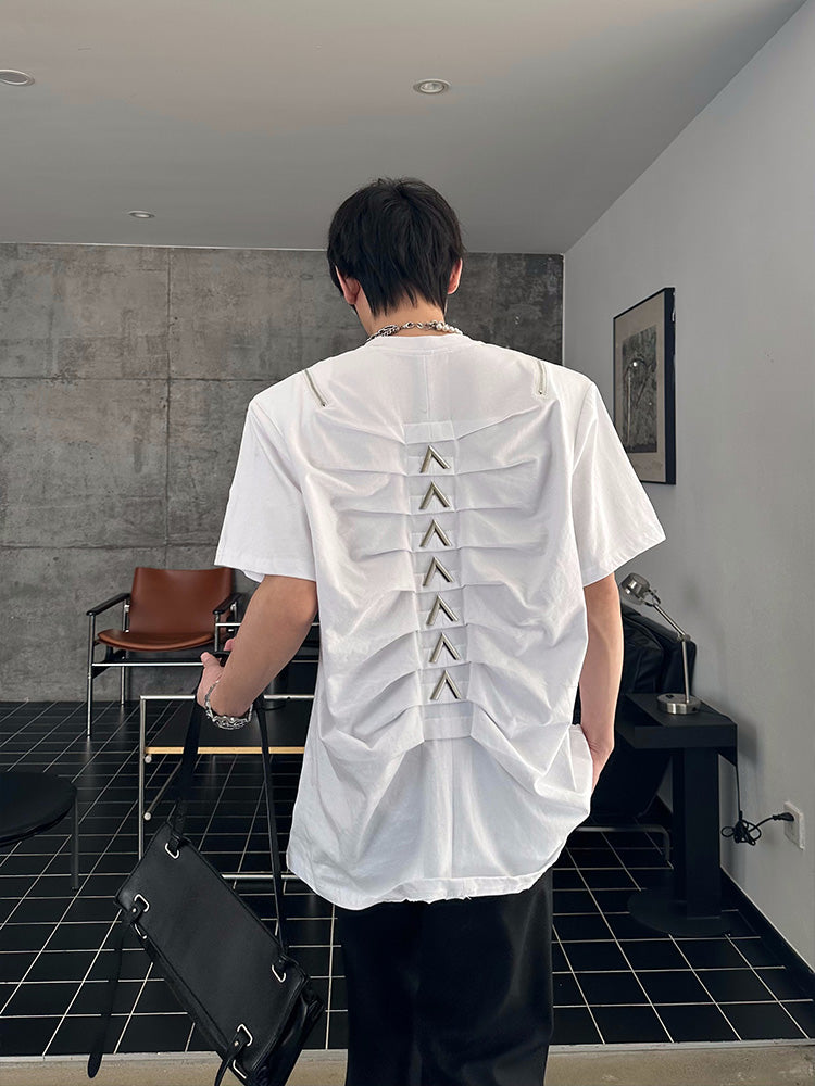Designed by Sanhoostudio, this T-shirt features spine-inspired metallic pleats paired with structured shoulder pads for a futuristic silhouette. Its innovative design and premium construction highlight an avant-garde streetwear vibe, balancing comfort with standout style for bold everyday looks.