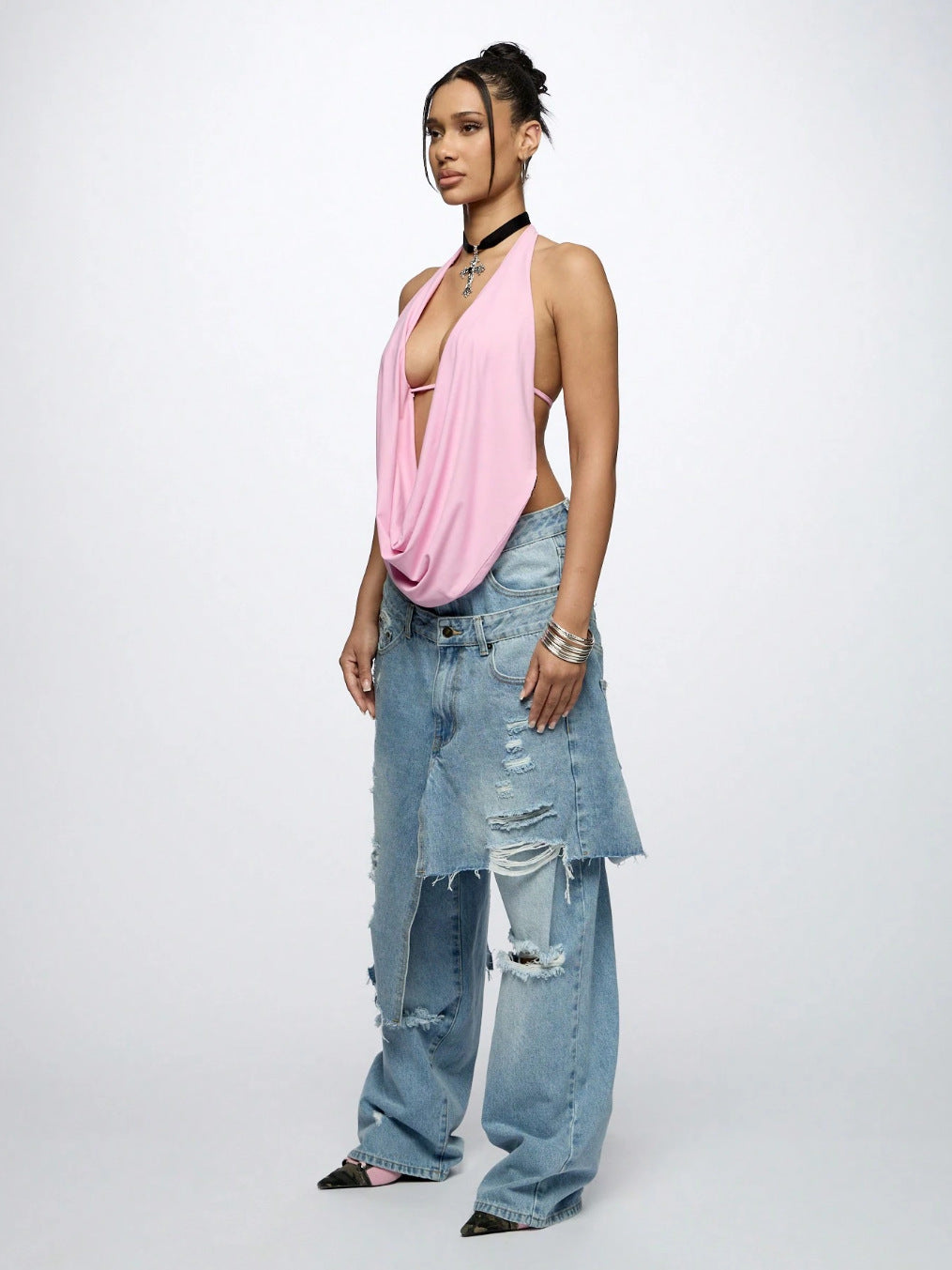 Upgrade your streetwear with the Loose Ripped High-Street Denim Jeans from Sanhoostudio. Designed with a relaxed fit and stylish distressed details, these jeans offer maximum comfort while keeping you effortlessly trendy. Perfect for casual outings and urban fashion looks.