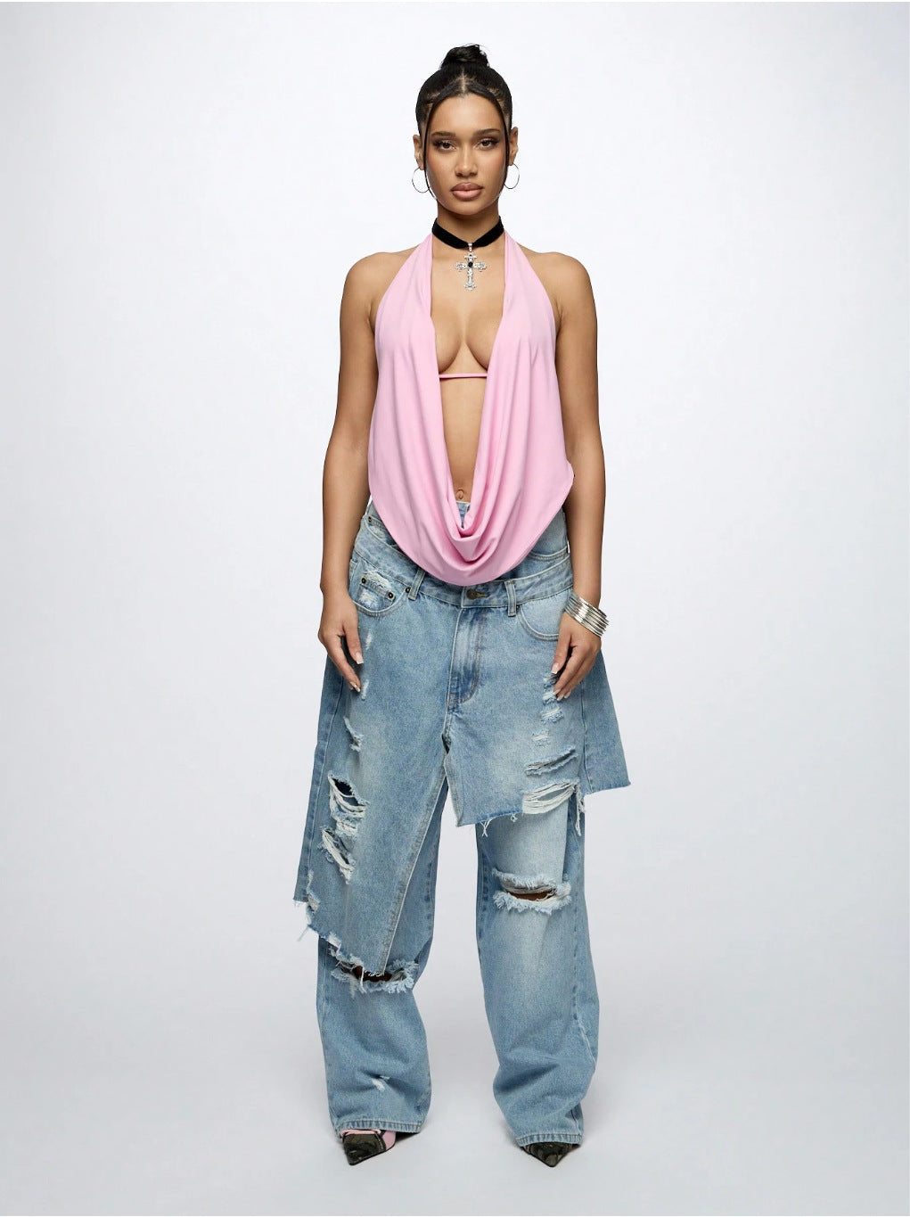 Upgrade your streetwear with the Loose Ripped High-Street Denim Jeans from Sanhoostudio. Designed with a relaxed fit and stylish distressed details, these jeans offer maximum comfort while keeping you effortlessly trendy. Perfect for casual outings and urban fashion looks.