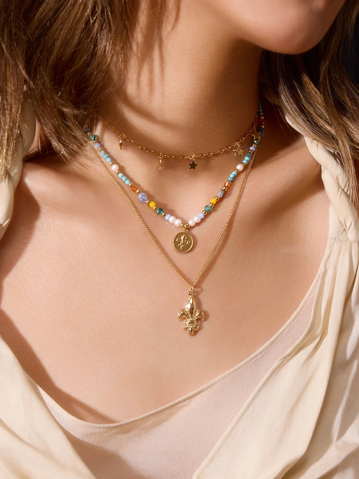 Sanhoostudio’s ocean-inspired necklace features colorful beads and a playful pendant. Perfect for beach vacations, layering, or couple gifts full of summer energy.