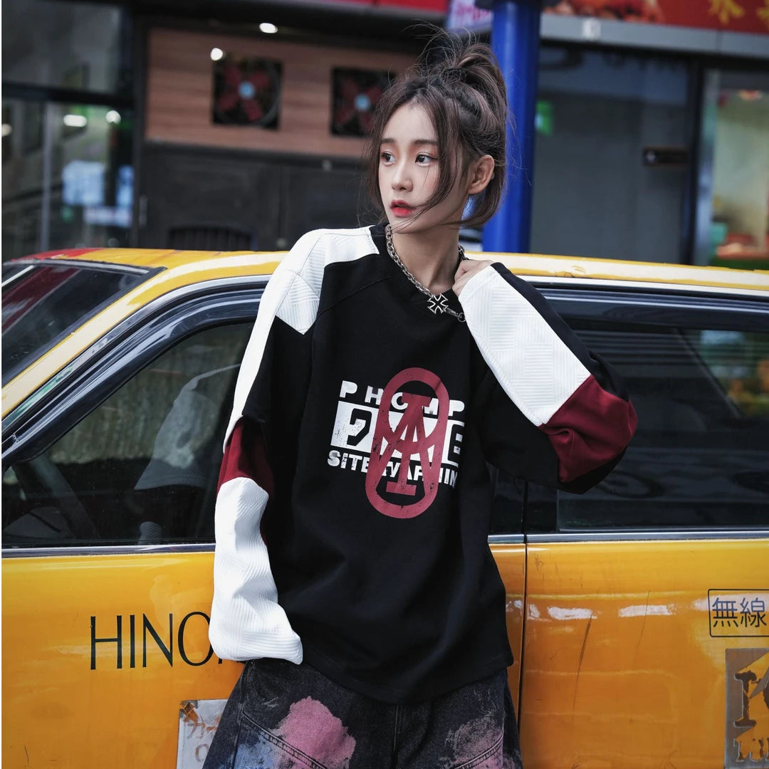 A vintage-inspired two-tone hoodie with a layered look and oversized silhouette. Comfortable, versatile, and perfect for daily streetwear.