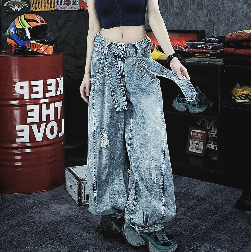 Retro-inspired wide-leg jeans featuring lantern-style drape and distressed cutouts. A unique American vintage streetwear statement.