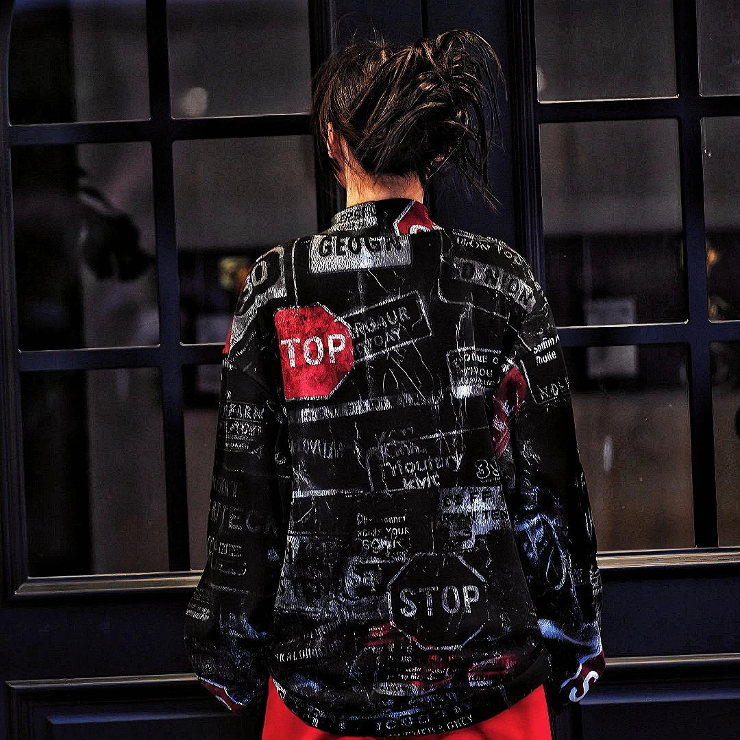 Sanhoostudio oversized graffiti shirt crafted from 100% nylon. Lightweight yet bold, featuring full graffiti print, sharp pointed collar, and relaxed hip-hop street silhouette for unisex styling.