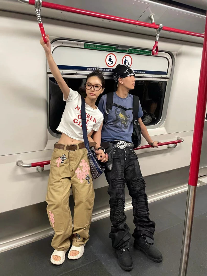 Sanhoostudio wax-finished denim pants made from breathable 100% cotton. Designed with curved cutting, distressed paneling, subtle stretch feel, and straight-leg silhouette for a bold dark street aesthetic.