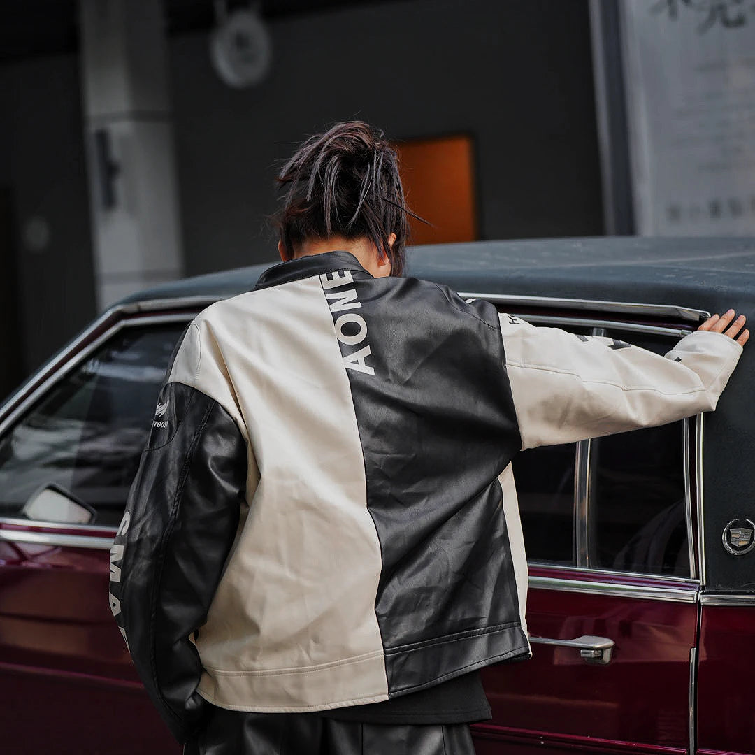 Sanhoostudio hooded leather jacket featuring distressed texture, colorblock panels, and utility pockets. Built for winter streetwear with bold high-street attitude.