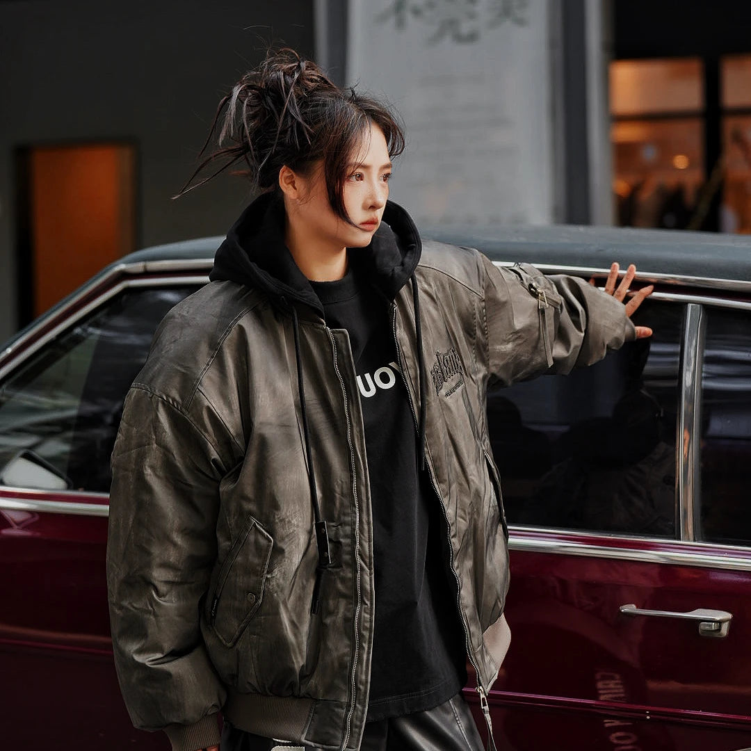 Sanhoostudio hooded leather jacket featuring distressed texture, colorblock panels, and utility pockets. Built for winter streetwear with bold high-street attitude.