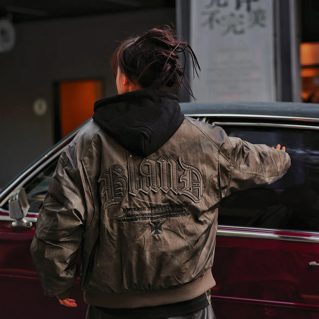 Sanhoostudio hooded leather jacket featuring distressed texture, colorblock panels, and utility pockets. Built for winter streetwear with bold high-street attitude.