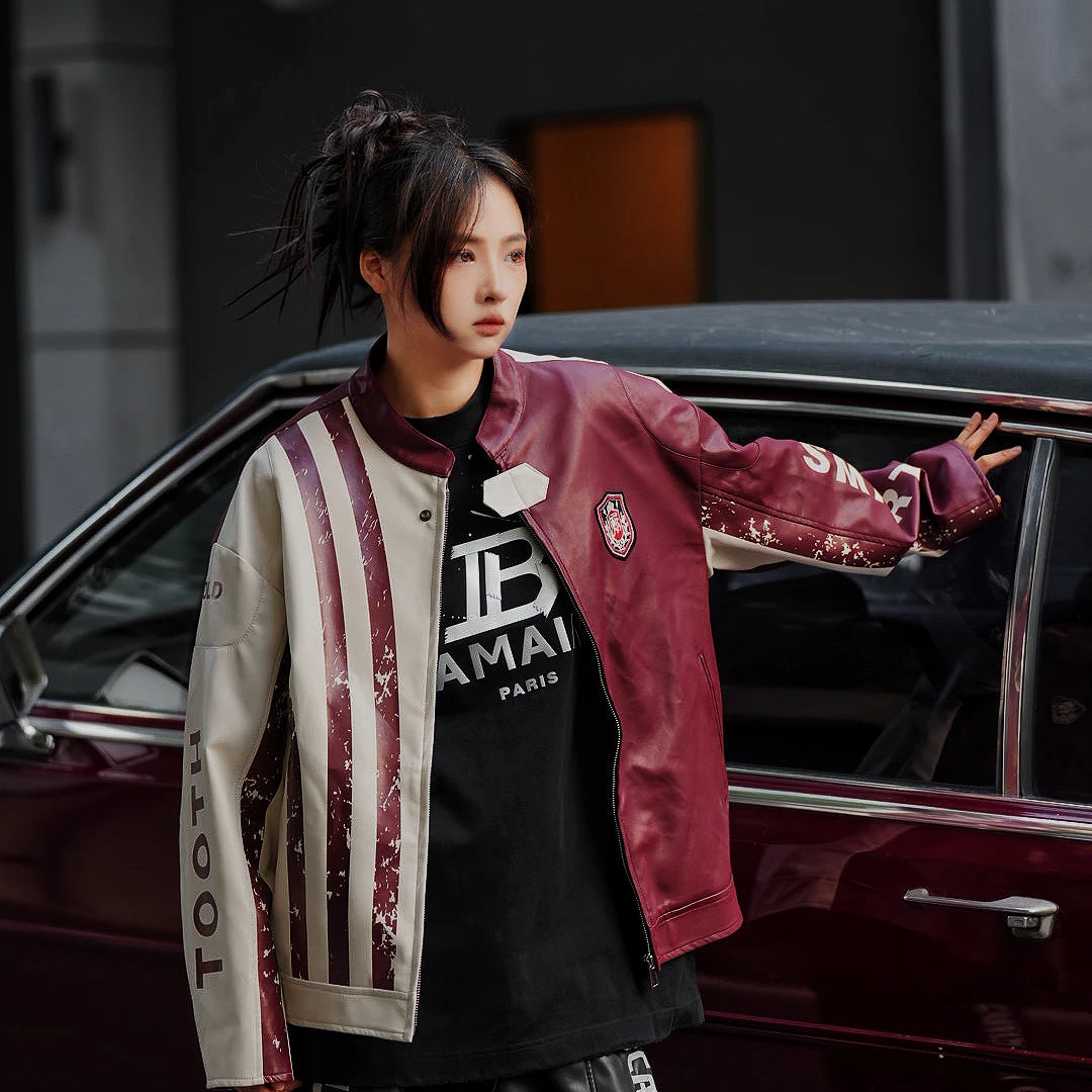 Sanhoostudio washed denim varsity jacket featuring contrast paneling and relaxed fit. A timeless unisex jacket for everyday streetwear layering.