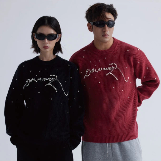 Sanhoostudio knit sweater featuring stud details and a relaxed fit. Designed for unisex autumn and winter streetwear layering.