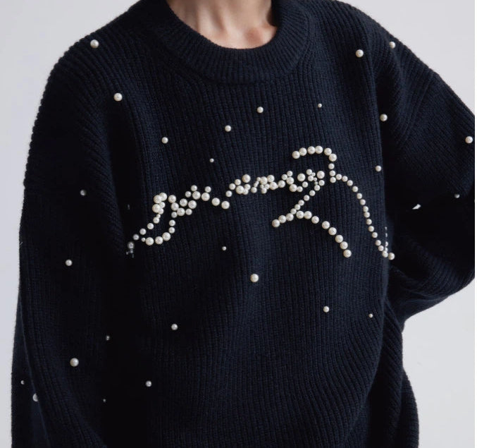 Sanhoostudio knit sweater featuring stud details and a relaxed fit. Designed for unisex autumn and winter streetwear layering.