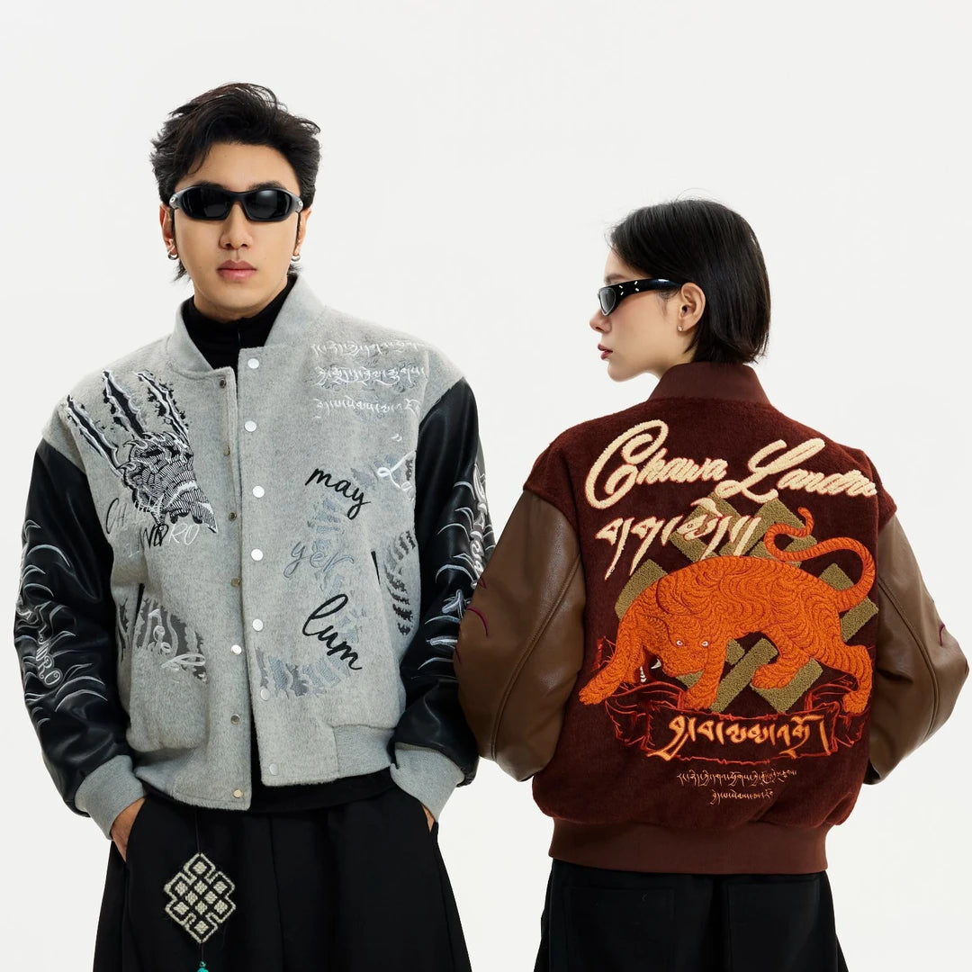 Sanhoostudio heavyweight varsity jacket featuring embroidered details and high street design. A bold unisex streetwear outerwear piece built for modern urban styling.