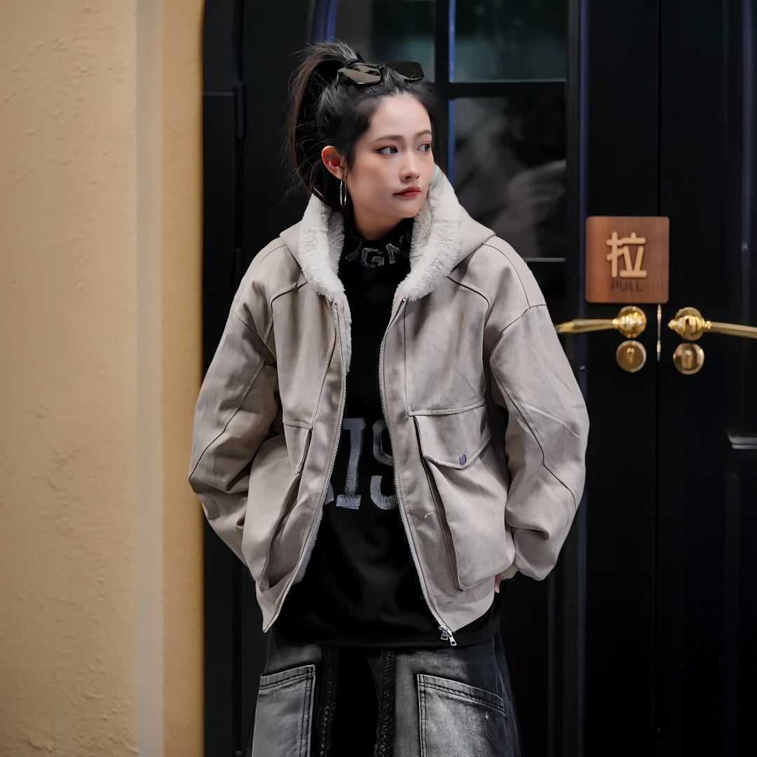 Sanhoostudio hooded puffer jacket in warm gray tone with a loose workwear fit. Designed for winter comfort and everyday streetwear looks.