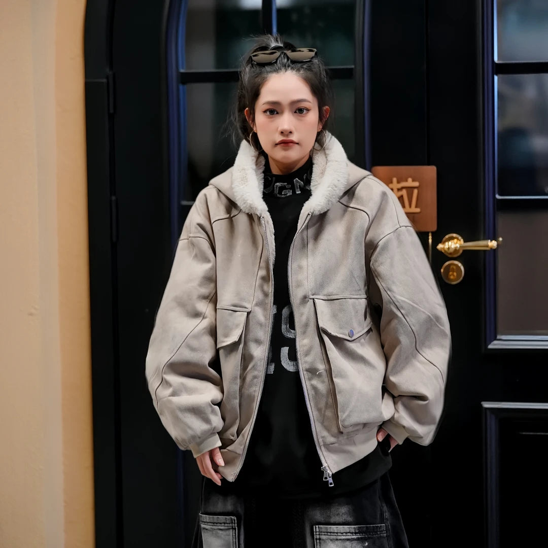 Sanhoostudio hooded puffer jacket in warm gray tone with a loose workwear fit. Designed for winter comfort and everyday streetwear looks.