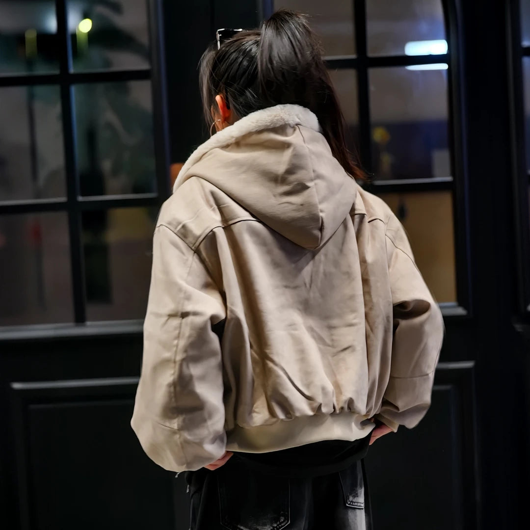 Sanhoostudio hooded puffer jacket in warm gray tone with a loose workwear fit. Designed for winter comfort and everyday streetwear looks.