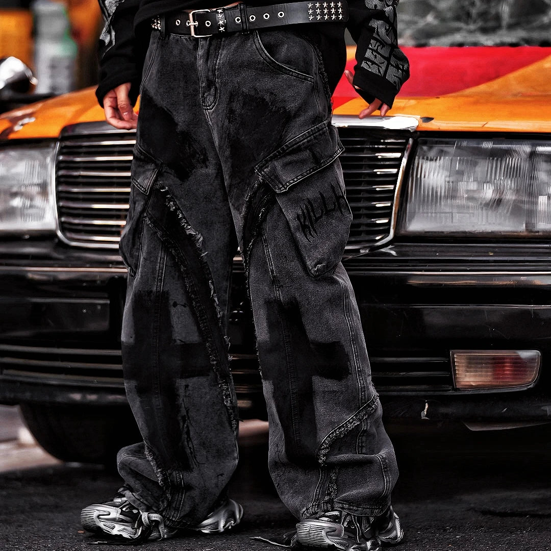 Sanhoostudio heavyweight denim featuring embroidery, graffiti artwork, and washed distressed finish. Designed with patchwork construction for bold unisex streetwear styling.