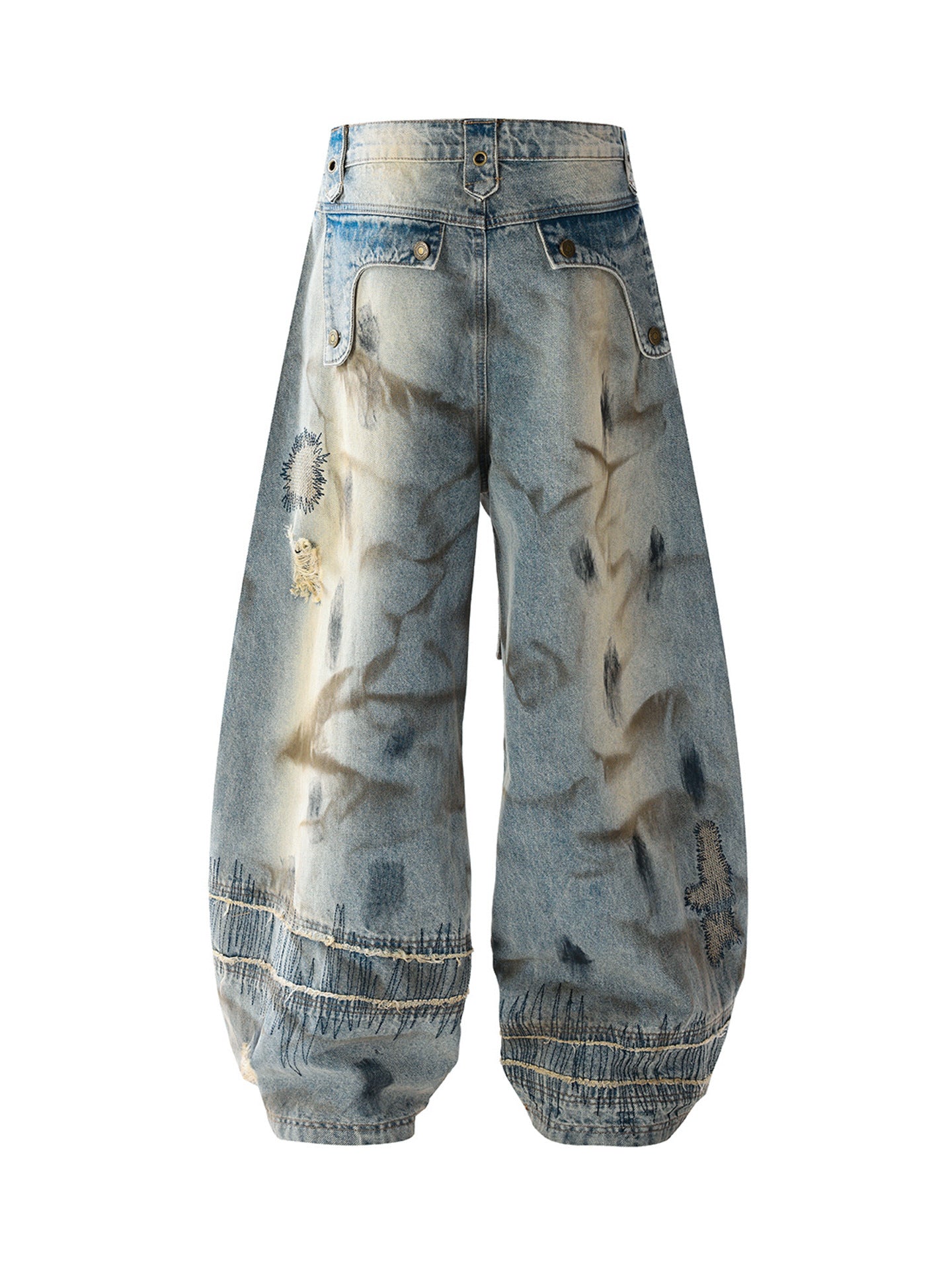 Sanhoostudio wide leg denim pants featuring distressed wash, heavy embroidery, and wasteland-inspired design. Built with a loose fit silhouette for bold streetwear styling.