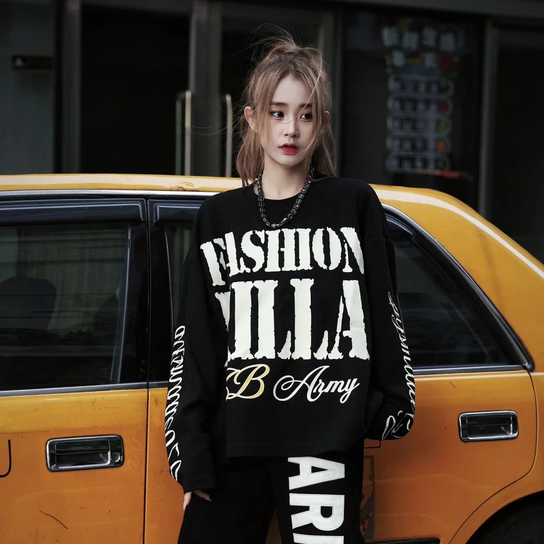 Sanhoostudio long sleeve T-shirt featuring graffiti letter print and vintage streetwear design for everyday urban styling.