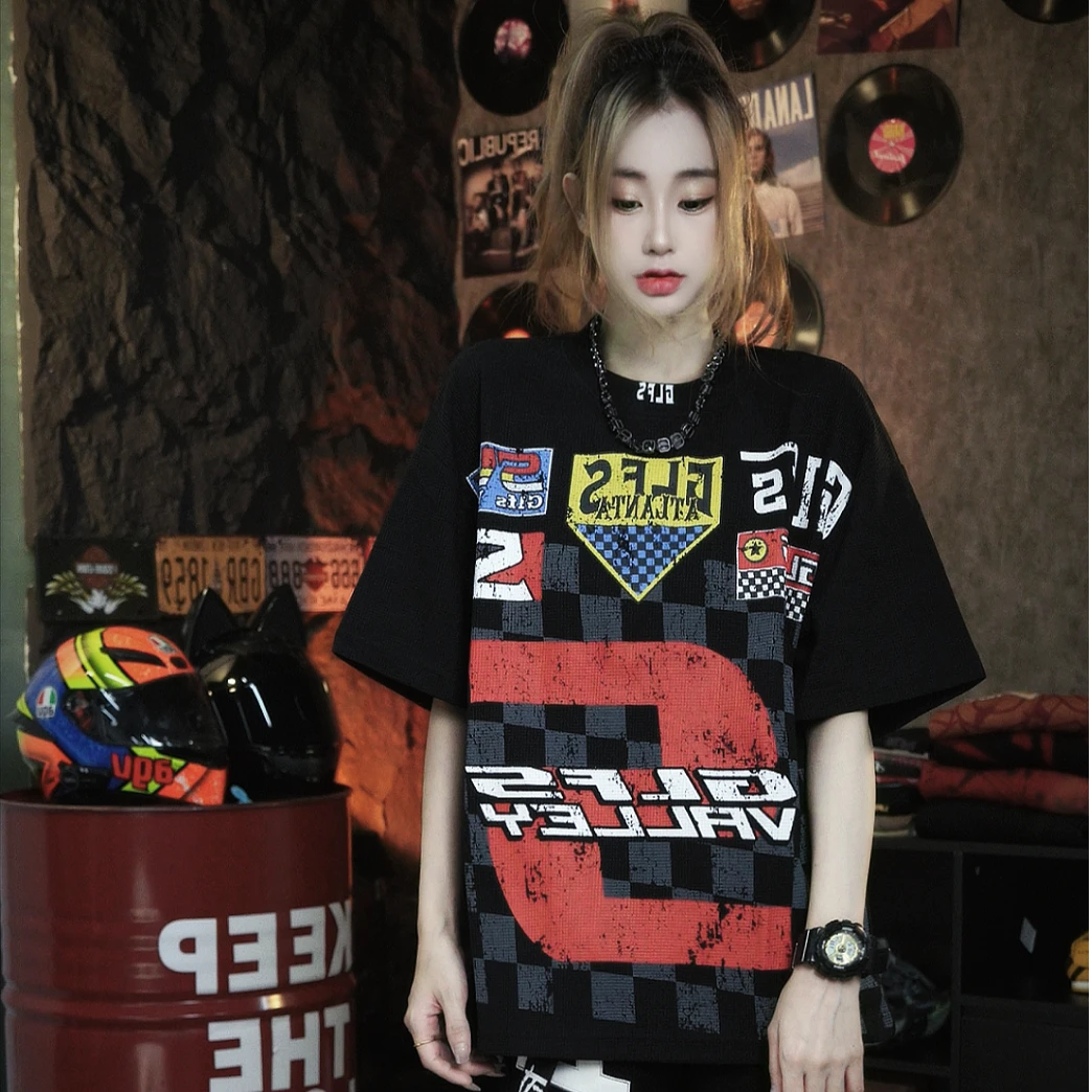 Sanhoostudio T-shirt featuring waffle knit texture, printed design, and relaxed fit for breathable summer streetwear styling.