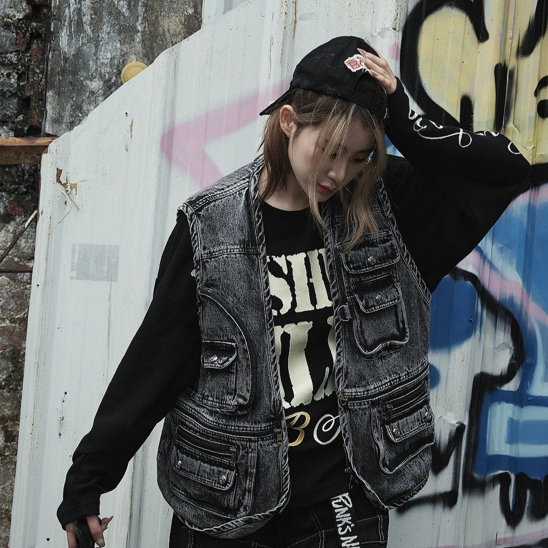 Sanhoostudio utility vest featuring multi-pocket design, distressed wash, and relaxed fit for functional streetwear styling.