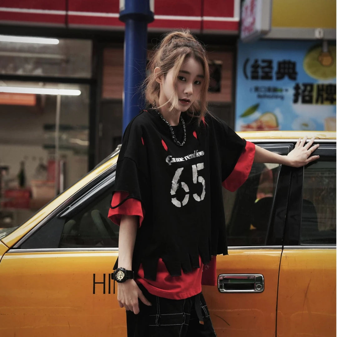 Sanhoostudio short sleeve T-shirt featuring distressed finish, ripped details, and relaxed fit design. Built for bold streetwear styling with a vintage-inspired aesthetic.
