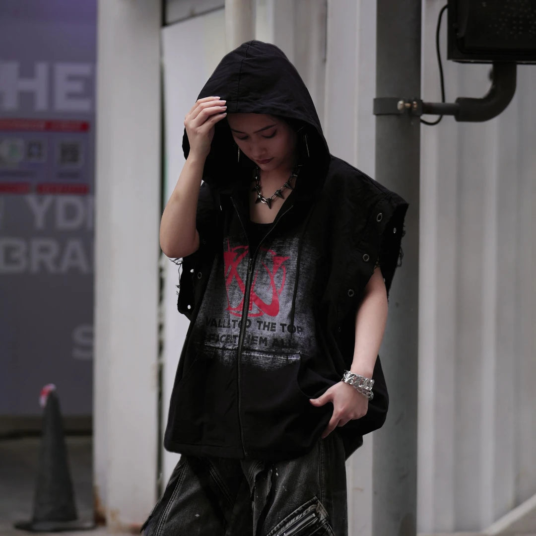 Sanhoostudio hooded vest featuring distressed finish, printed graphics, and sleeveless construction. Designed for layering in streetwear outfits, offering lightweight comfort, flexibility, and a strong modern utility aesthetic.