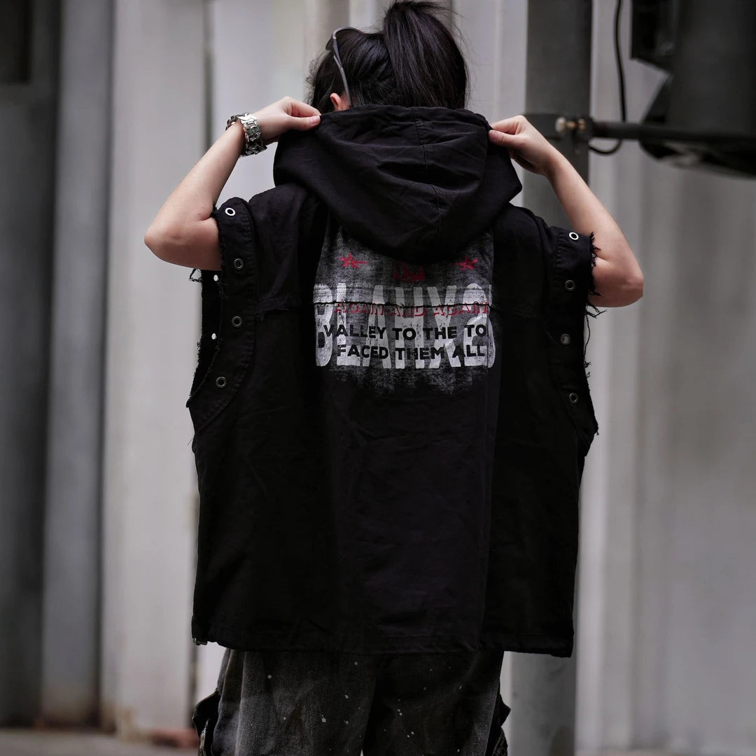 Sanhoostudio hooded vest featuring distressed finish, printed graphics, and sleeveless construction. Designed for layering in streetwear outfits, offering lightweight comfort, flexibility, and a strong modern utility aesthetic.