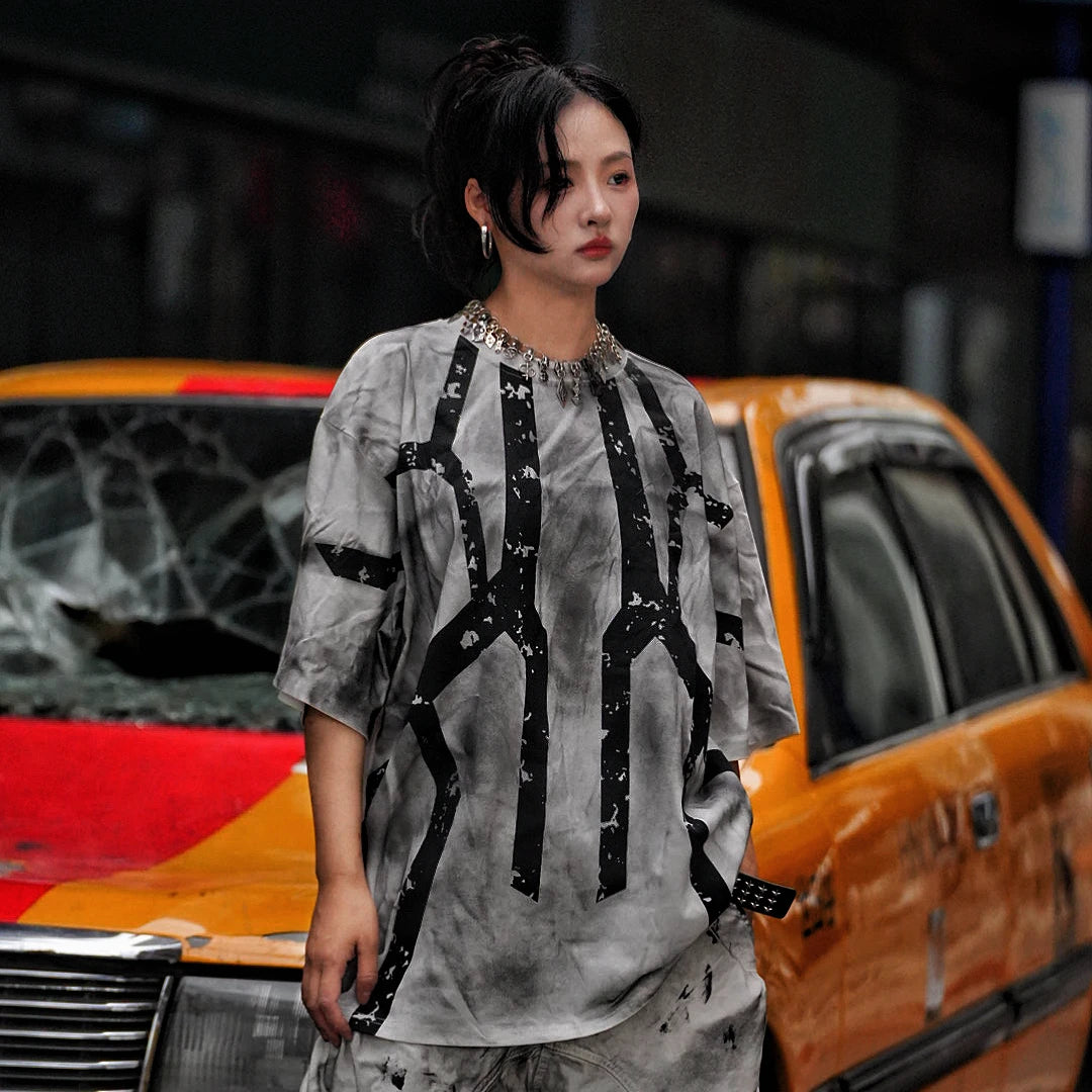 Sanhoostudio short sleeve T-shirt featuring tie dye finish, graphic print design, and relaxed fit silhouette. Designed for modern streetwear outfits with breathable comfort, bold visual appeal, and versatile everyday wear.