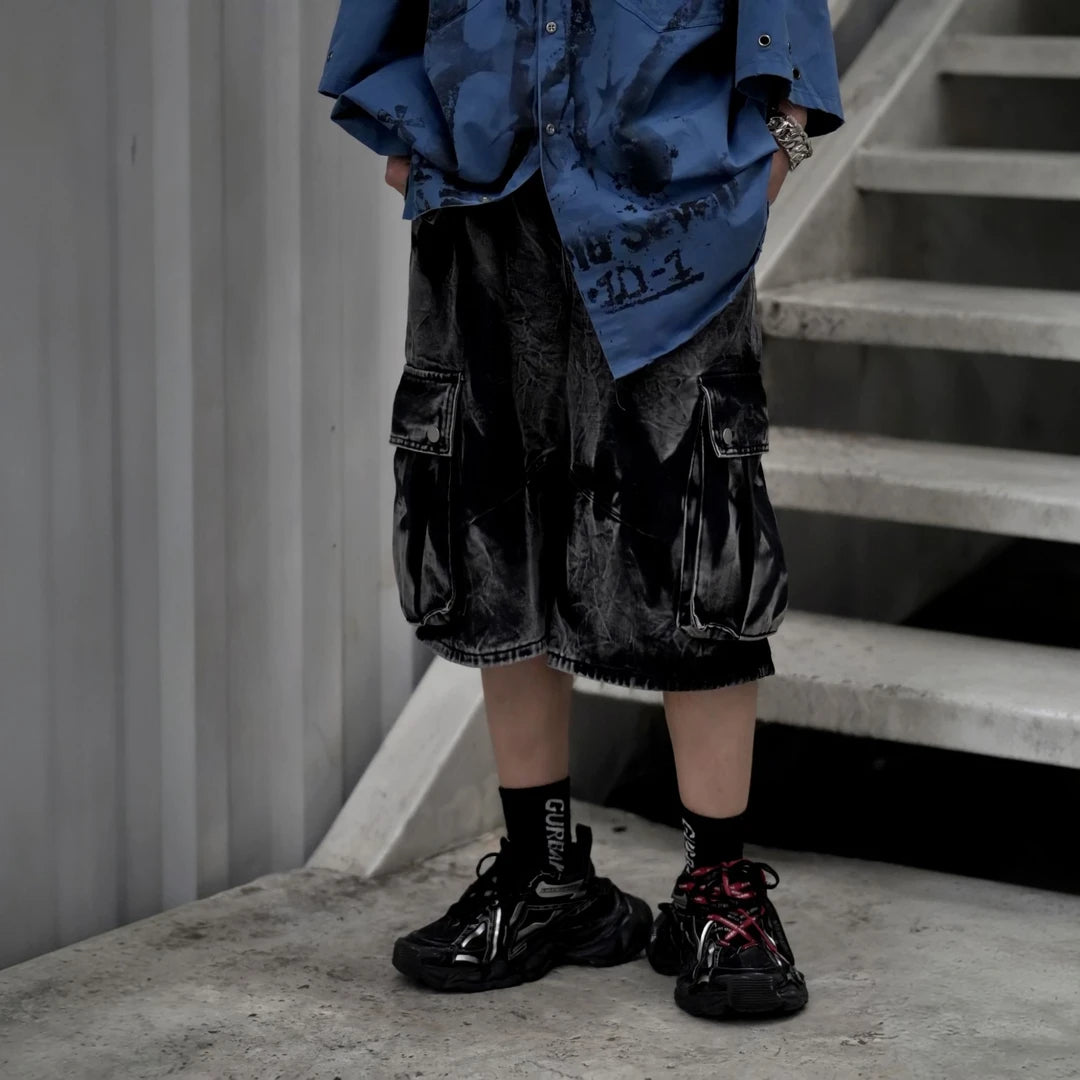 Sanhoostudio denim cargo shorts featuring vintage washed finish, wide leg silhouette, and functional design. Perfect for summer streetwear outfits with comfort, breathability, and casual versatility.