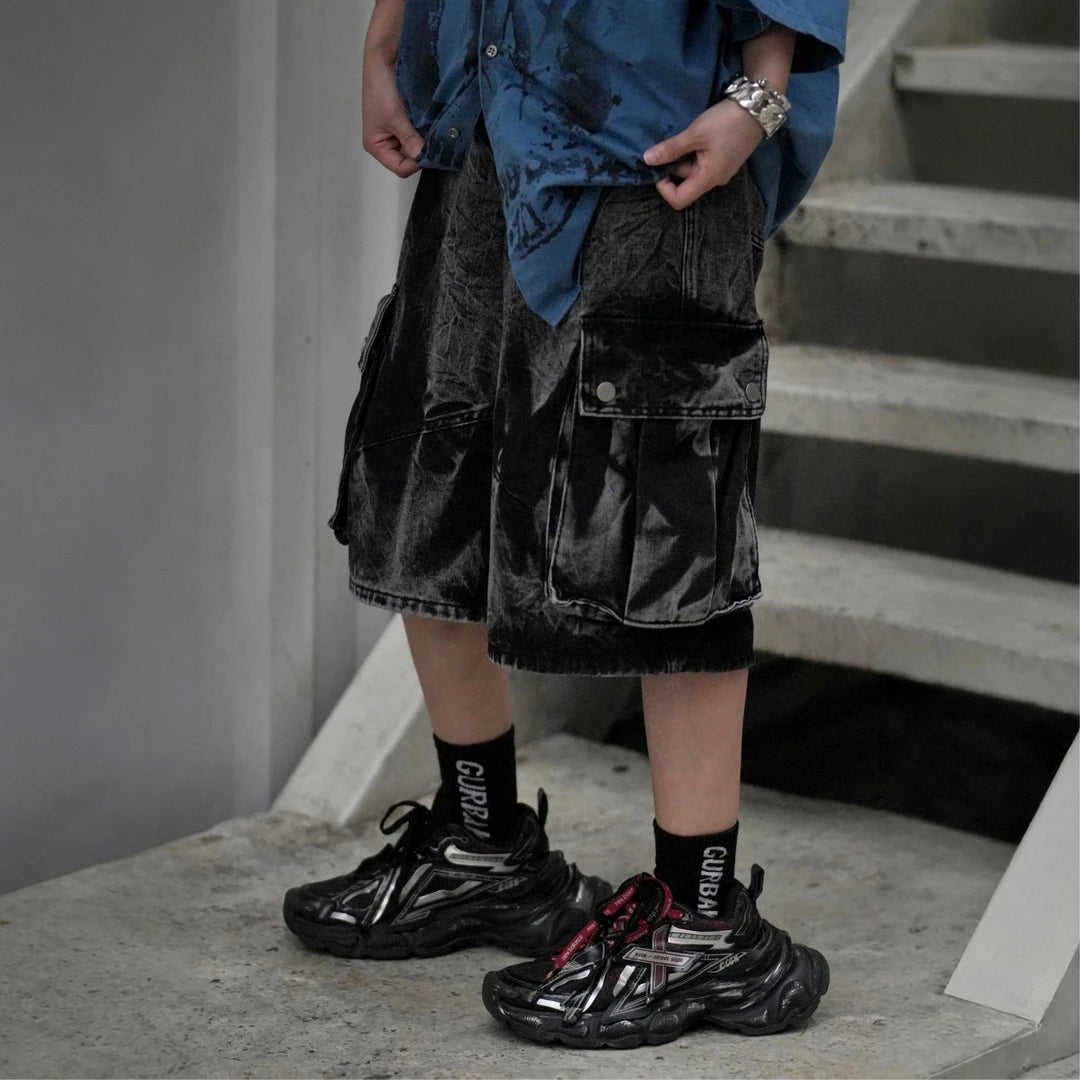 Sanhoostudio denim cargo shorts featuring vintage washed finish, wide leg silhouette, and functional design. Perfect for summer streetwear outfits with comfort, breathability, and casual versatility.