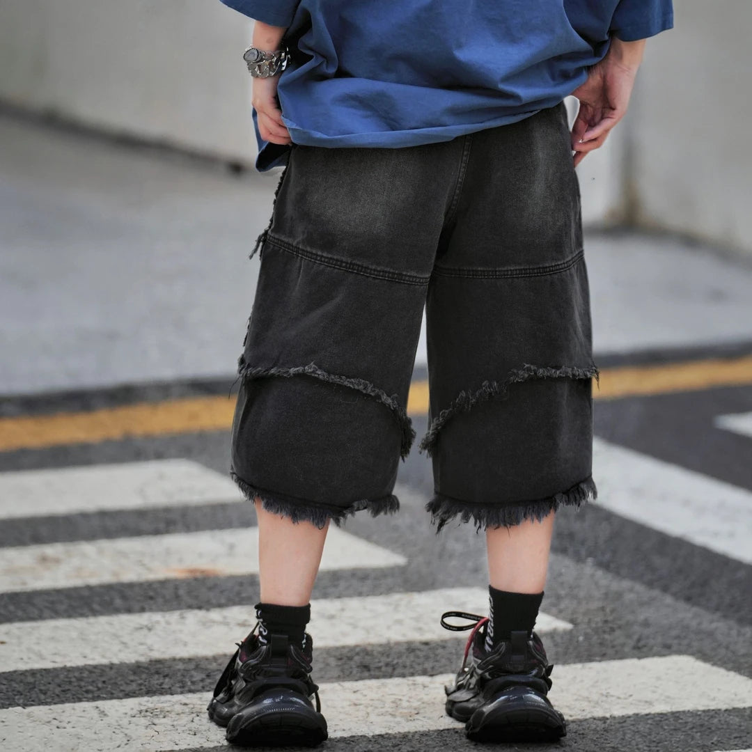 Sanhoostudio denim shorts featuring distressed wash, wide leg silhouette, and relaxed fit design. Perfect for summer streetwear outfits with comfort, durability, and versatile styling.