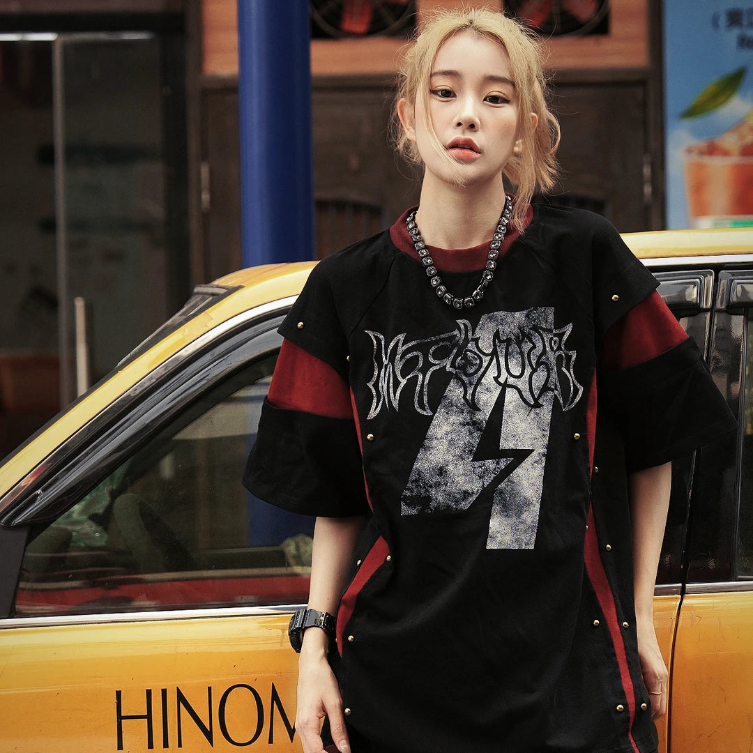 Sanhoostudio short sleeve T-shirt featuring studded details, colorblock design, and relaxed fit silhouette. A bold streetwear piece designed for standout looks with comfort and everyday wearability.