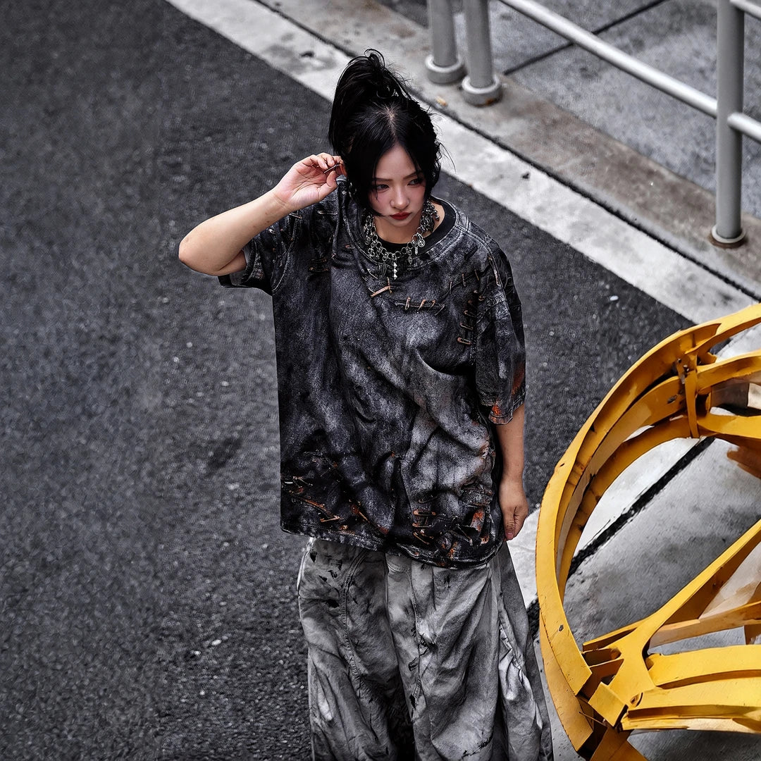 Sanhoostudio short sleeve T-shirt featuring graphic print design and oversized fit silhouette. Designed for modern streetwear outfits with breathable comfort, lightweight feel, and versatile everyday styling.