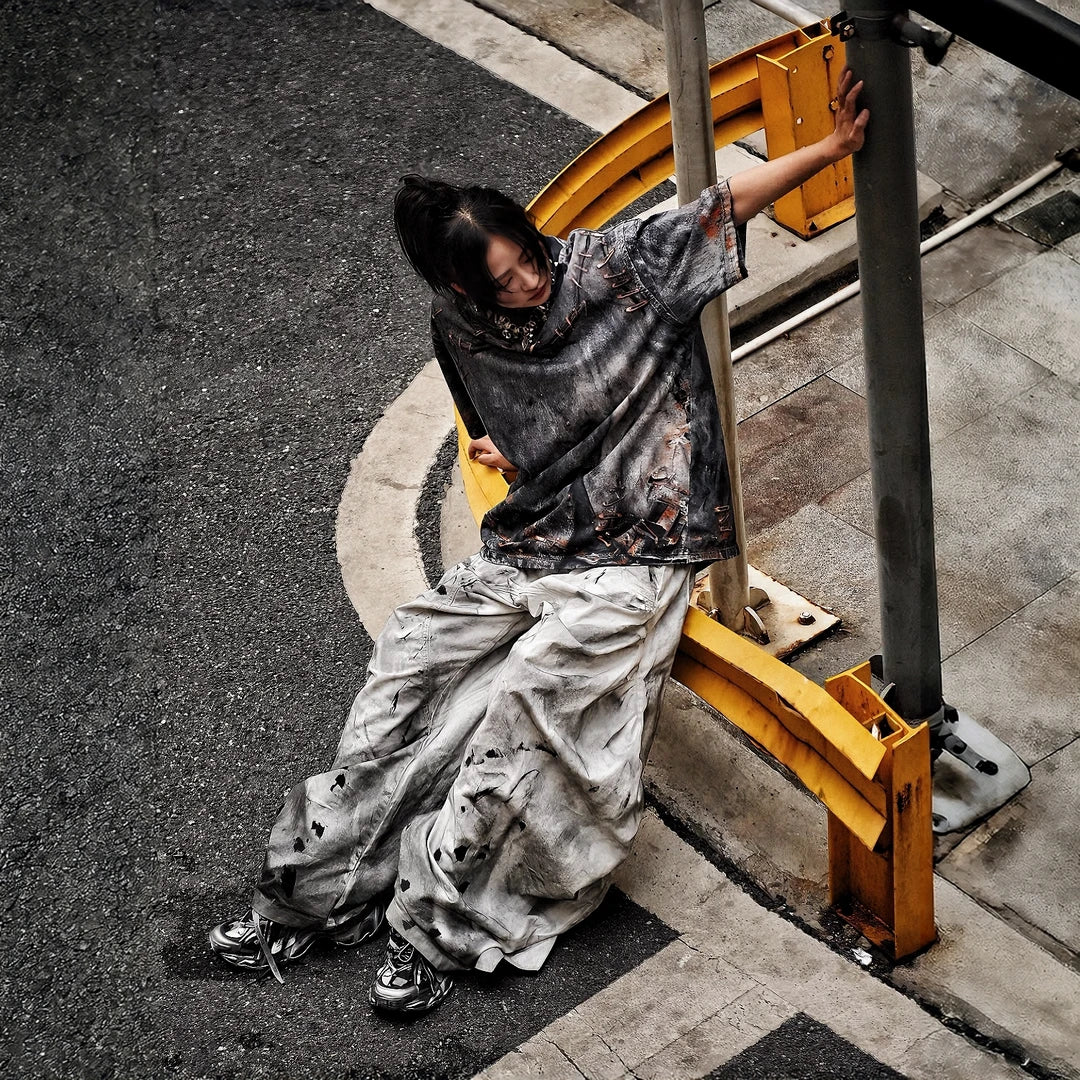 Sanhoostudio short sleeve T-shirt featuring graphic print design and oversized fit silhouette. Designed for modern streetwear outfits with breathable comfort, lightweight feel, and versatile everyday styling.