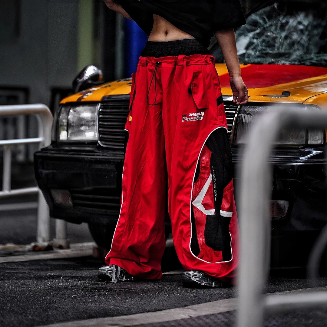 Sanhoostudio denim pants featuring graffiti artwork, patchwork construction, and distressed finish. Built for bold streetwear outfits with wide leg fit, durability, and standout visual styling.