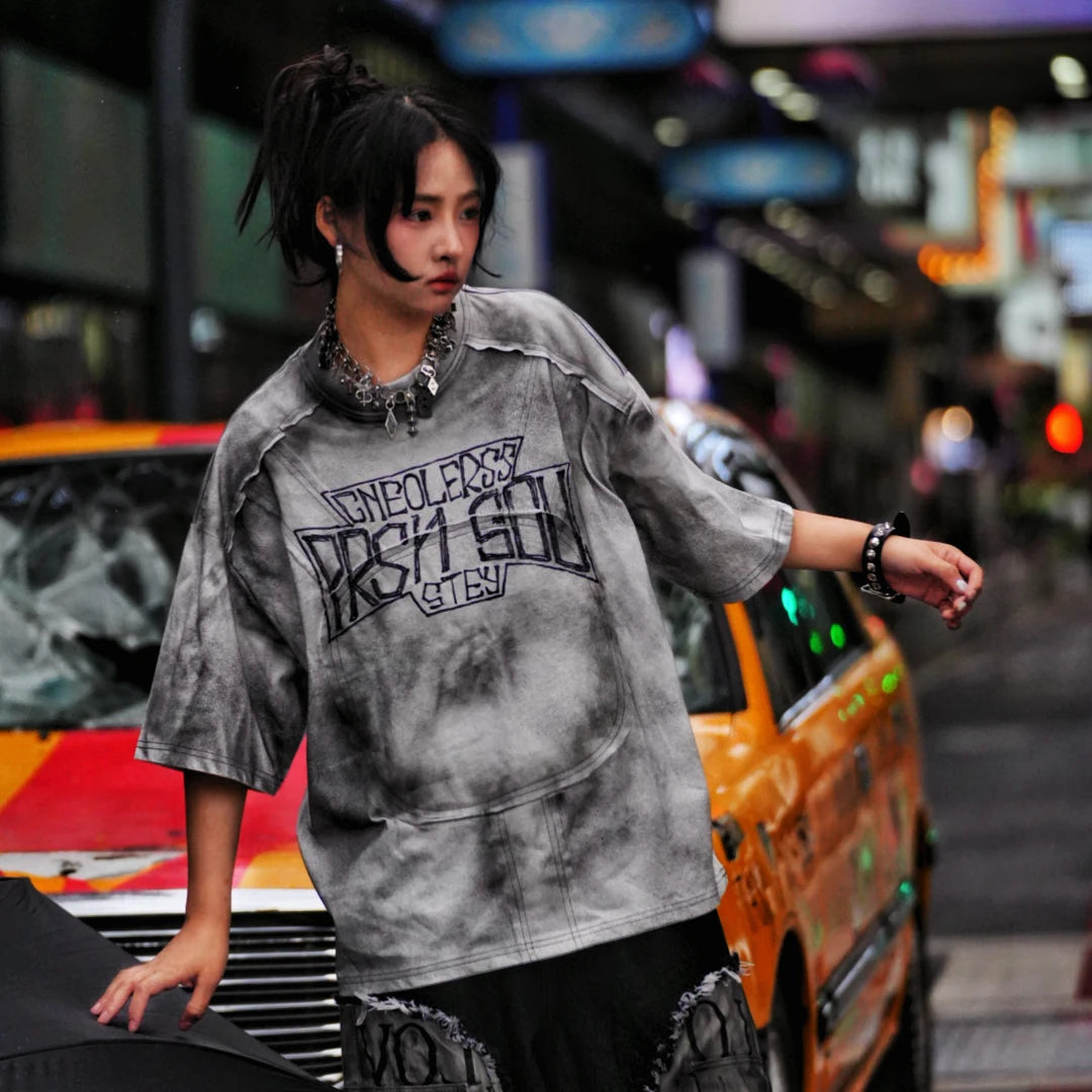 Sanhoostudio oversized short sleeve T-shirt featuring graphic print design and relaxed fit silhouette. Perfect for streetwear outfits with breathable fabric, lightweight feel, and daily casual styling.