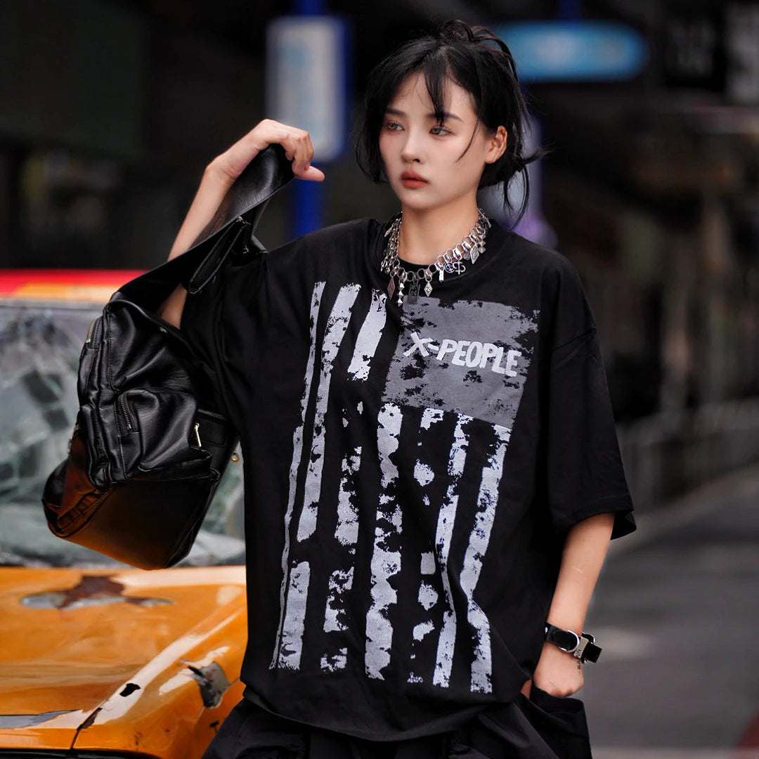 Sanhoostudio short sleeve T-shirt featuring tie dye finish, graphic spray print, and oversized fit silhouette. Perfect for summer streetwear styling with breathable comfort and standout visual design.