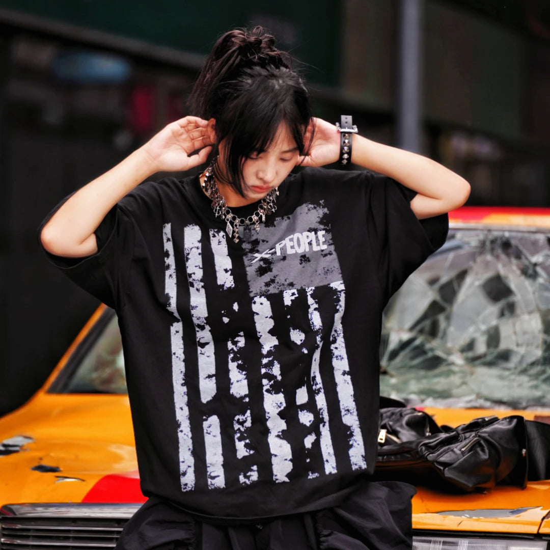 Sanhoostudio short sleeve T-shirt featuring tie dye finish, graphic spray print, and oversized fit silhouette. Perfect for summer streetwear styling with breathable comfort and standout visual design.