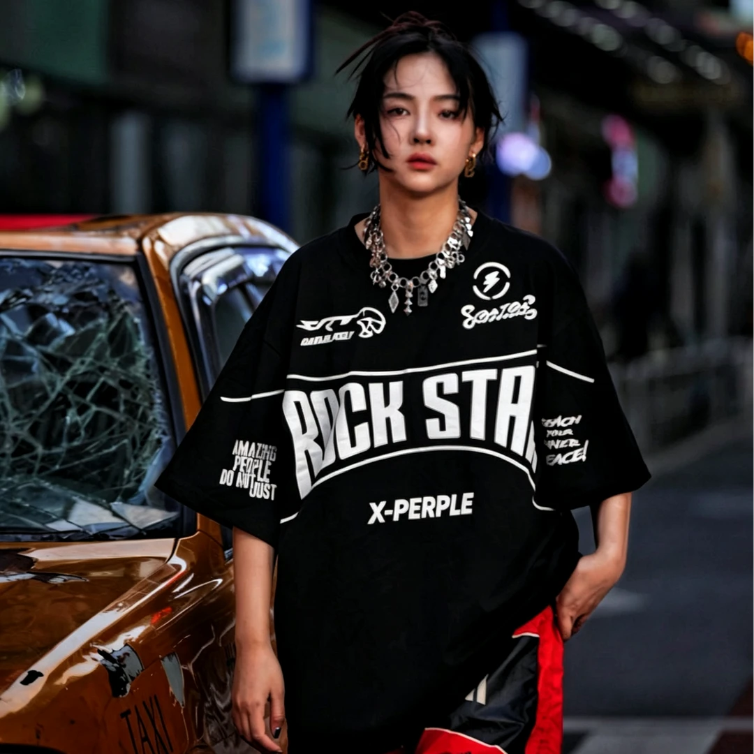 Sanhoostudio short sleeve T-shirt featuring flame-inspired graphic artwork, spray print detailing, and a relaxed oversized silhouette. Designed for modern streetwear styling with breathable comfort and visual impact.
