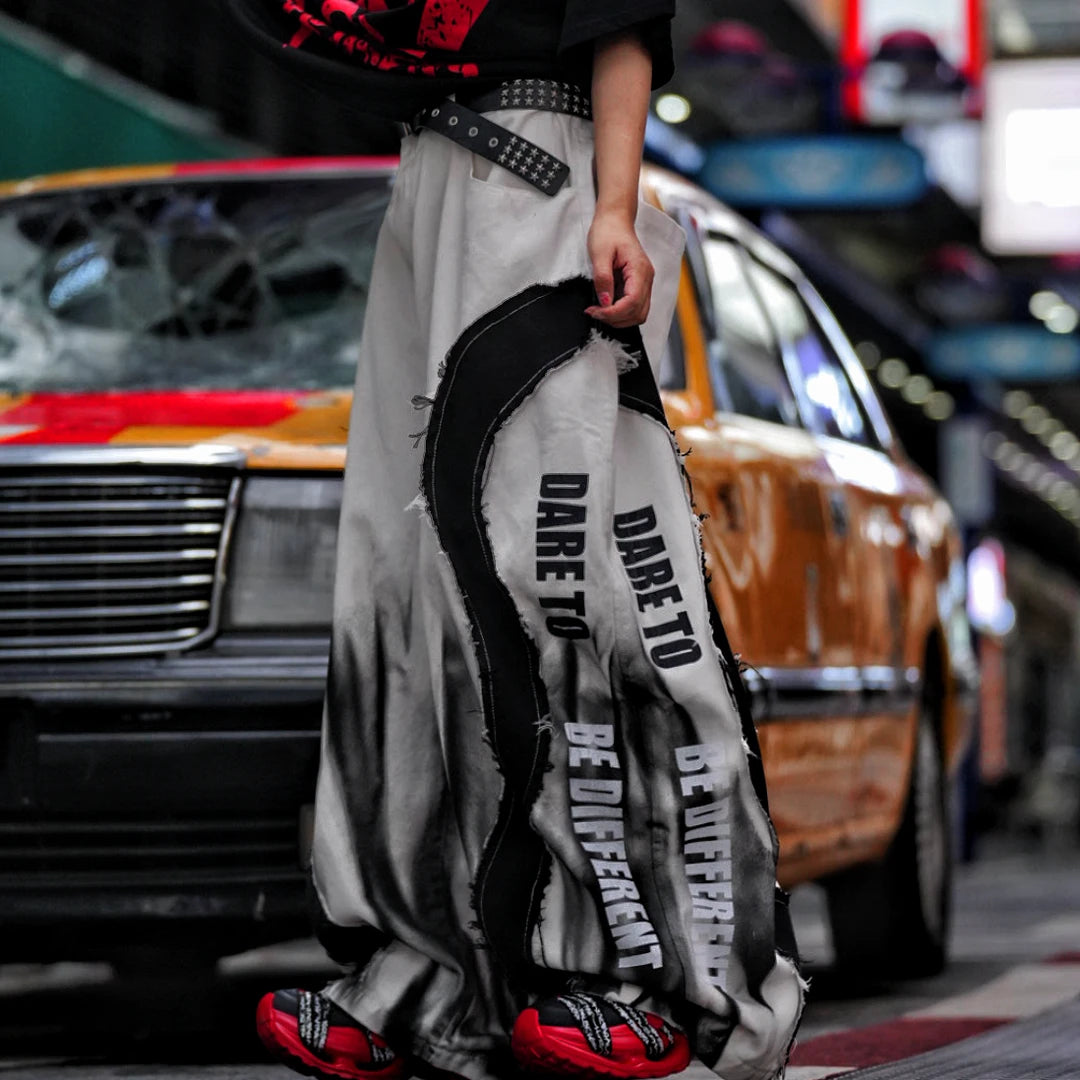 Sanhoostudio denim pants featuring distressed wash effects, wide leg scythe-cut tailoring, and a relaxed fit silhouette. Built for everyday streetwear outfits with comfort, durability, and modern styling.