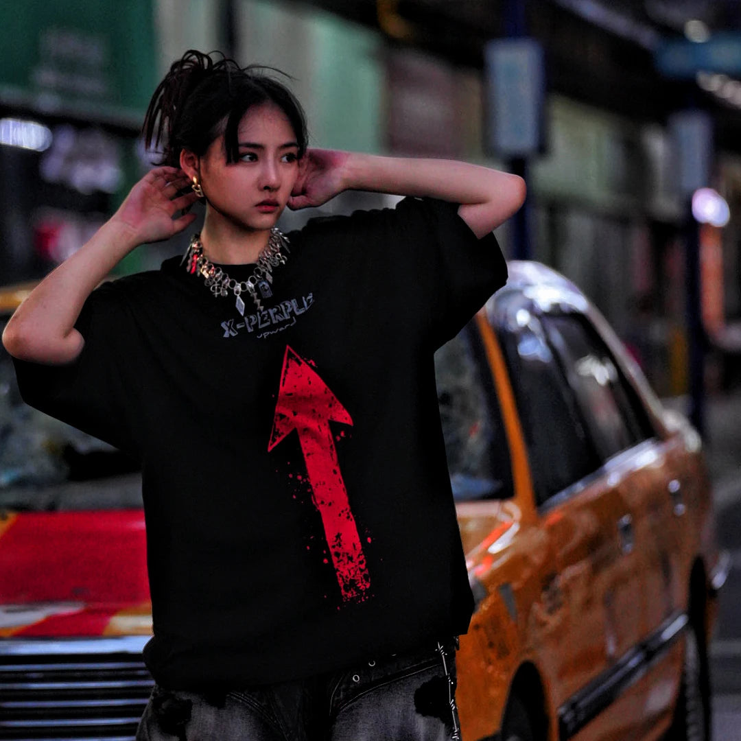 Sanhoostudio short sleeve T-shirt featuring arrow-inspired spray print graphics and a relaxed oversized fit. Designed for summer streetwear styling with breathable comfort and bold visual character.