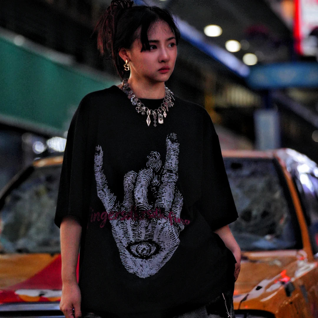 Sanhoostudio short sleeve T-shirt featuring fingerprint-inspired spray print artwork, breathable fabric construction, and a relaxed oversized fit. Designed for modern streetwear styling with all-day comfort, lightweight wearability, and standout graphic appeal for summer outfits.