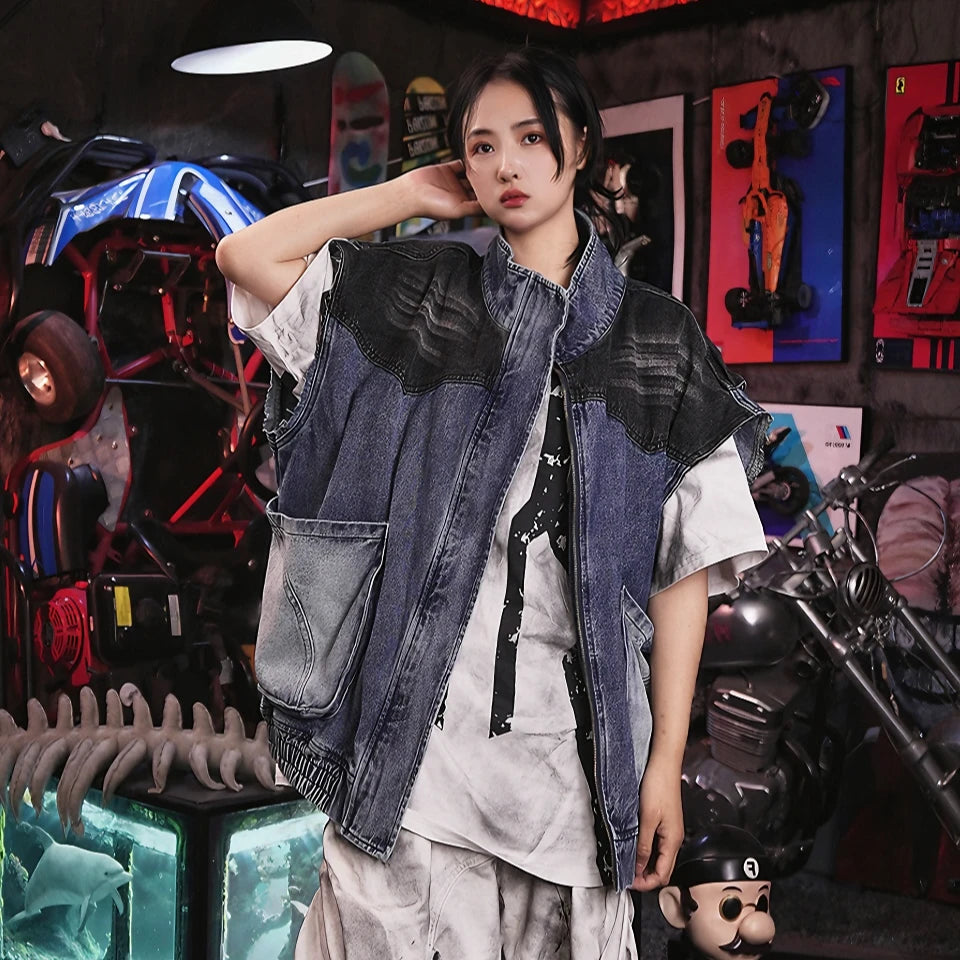 Sanhoostudio denim jacket featuring hand-painted graffiti artwork, distressed wash treatment, mud-dye effects, and an oversized silhouette. Designed for premium streetwear styling with strong visual character and versatile layering appeal.