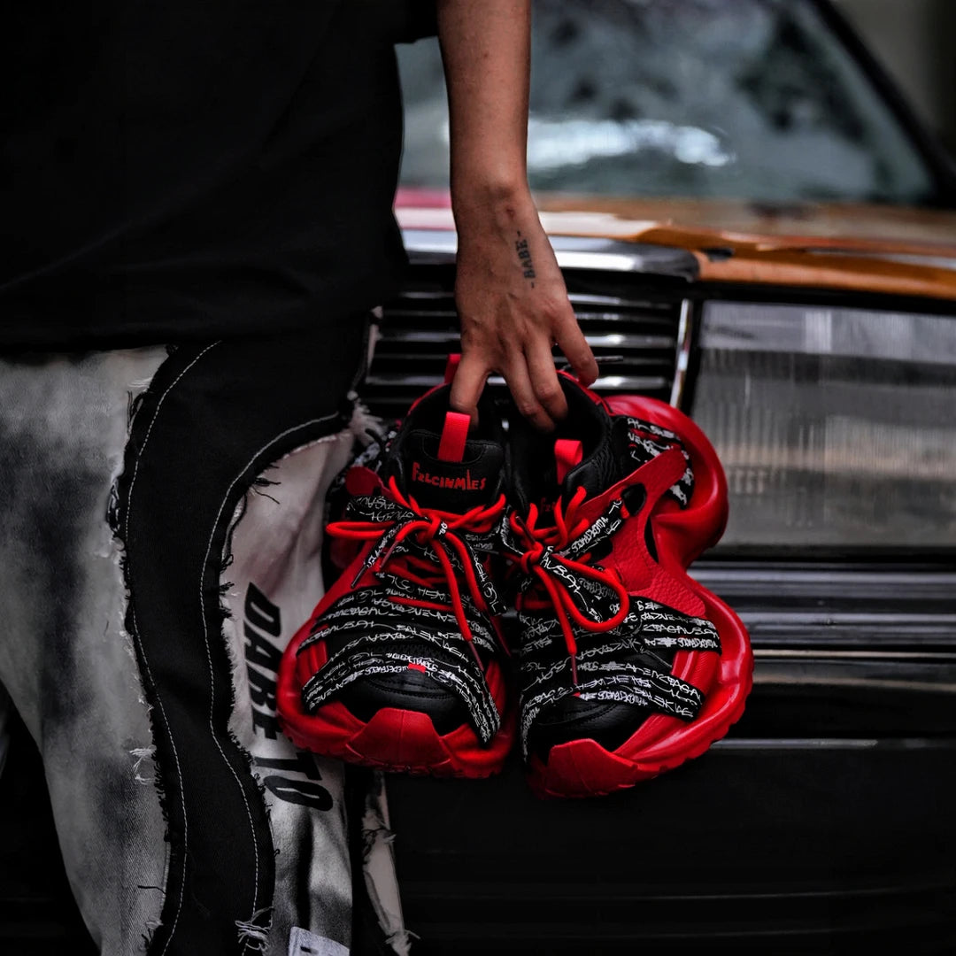 Sanhoostudio dad sneakers featuring a black and red colorblock design, cushioned sole construction, and a versatile streetwear silhouette. Built for everyday comfort, durable performance, and effortless styling with casual and urban outfits.