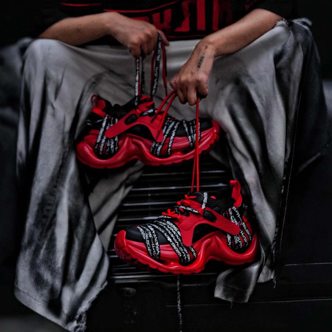 Sanhoostudio dad sneakers featuring a black and red colorblock design, cushioned sole construction, and a versatile streetwear silhouette. Built for everyday comfort, durable performance, and effortless styling with casual and urban outfits.
