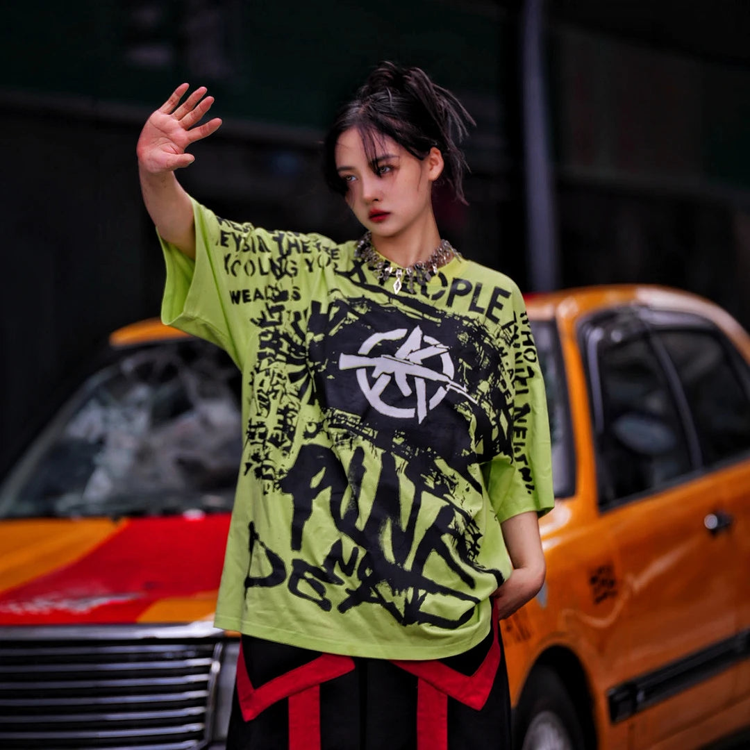 Sanhoostudio short sleeve T-shirt featuring spray-print artwork, breathable fabric construction, and an oversized fit silhouette. Designed for modern streetwear styling with comfort and standout summer appeal.