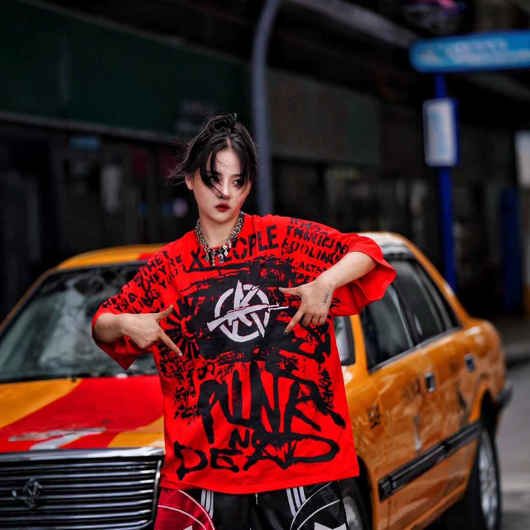 Sanhoostudio short sleeve T-shirt featuring spray-print artwork, breathable fabric construction, and an oversized fit silhouette. Designed for modern streetwear styling with comfort and standout summer appeal.